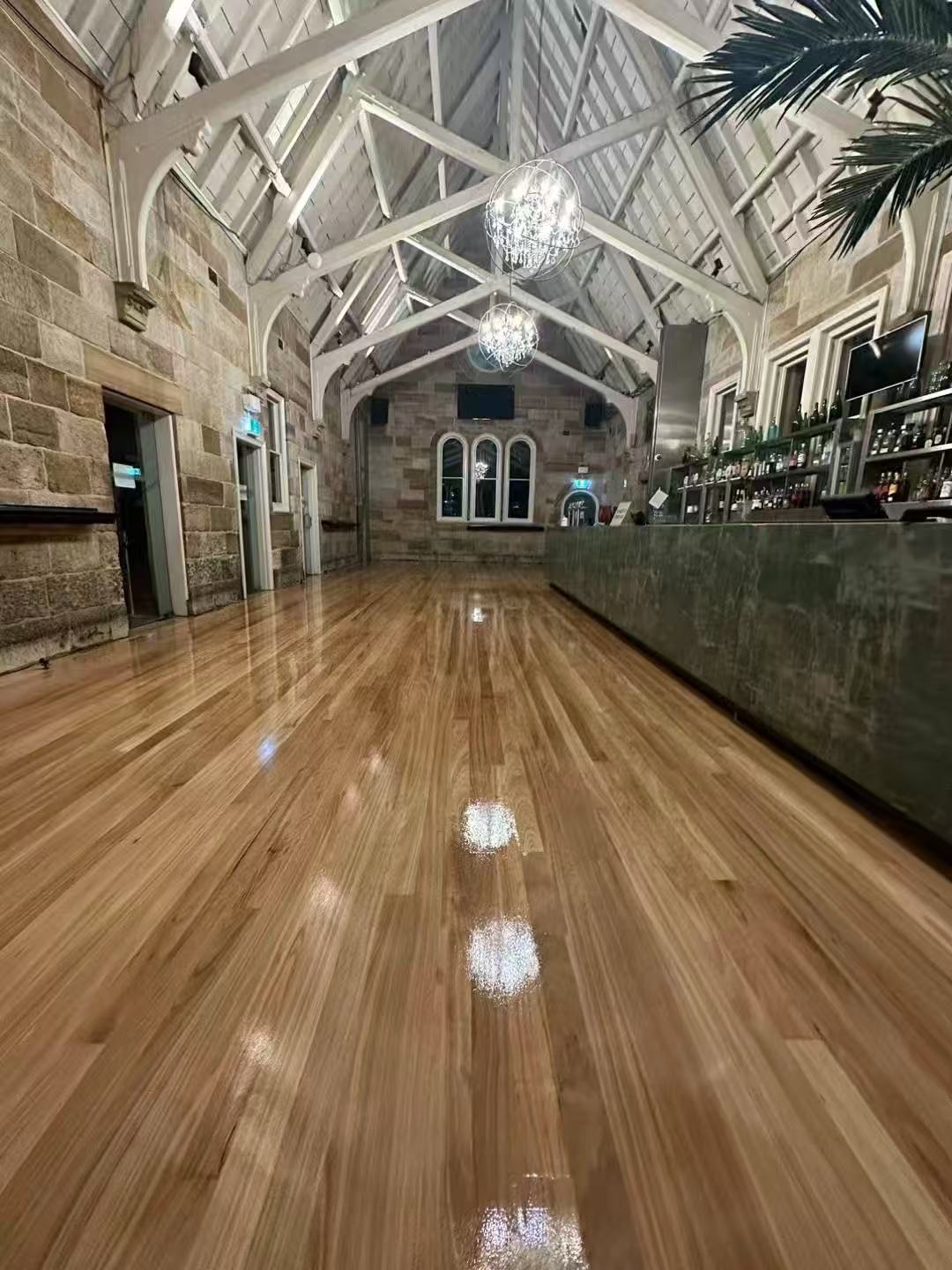 Full sand and polish, high-gloss timber floor finish, heritage venue, Sydney