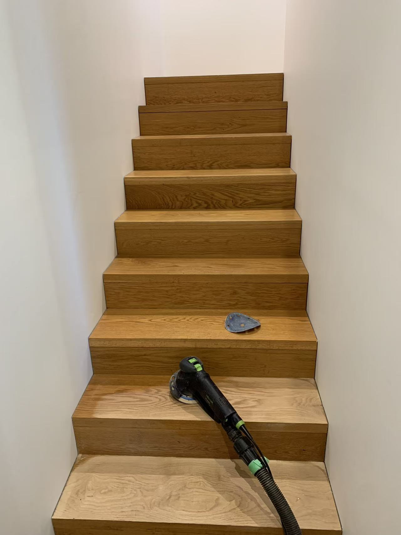 Timber staircase mid-sand, dust-contained sanding equipment, Kiama