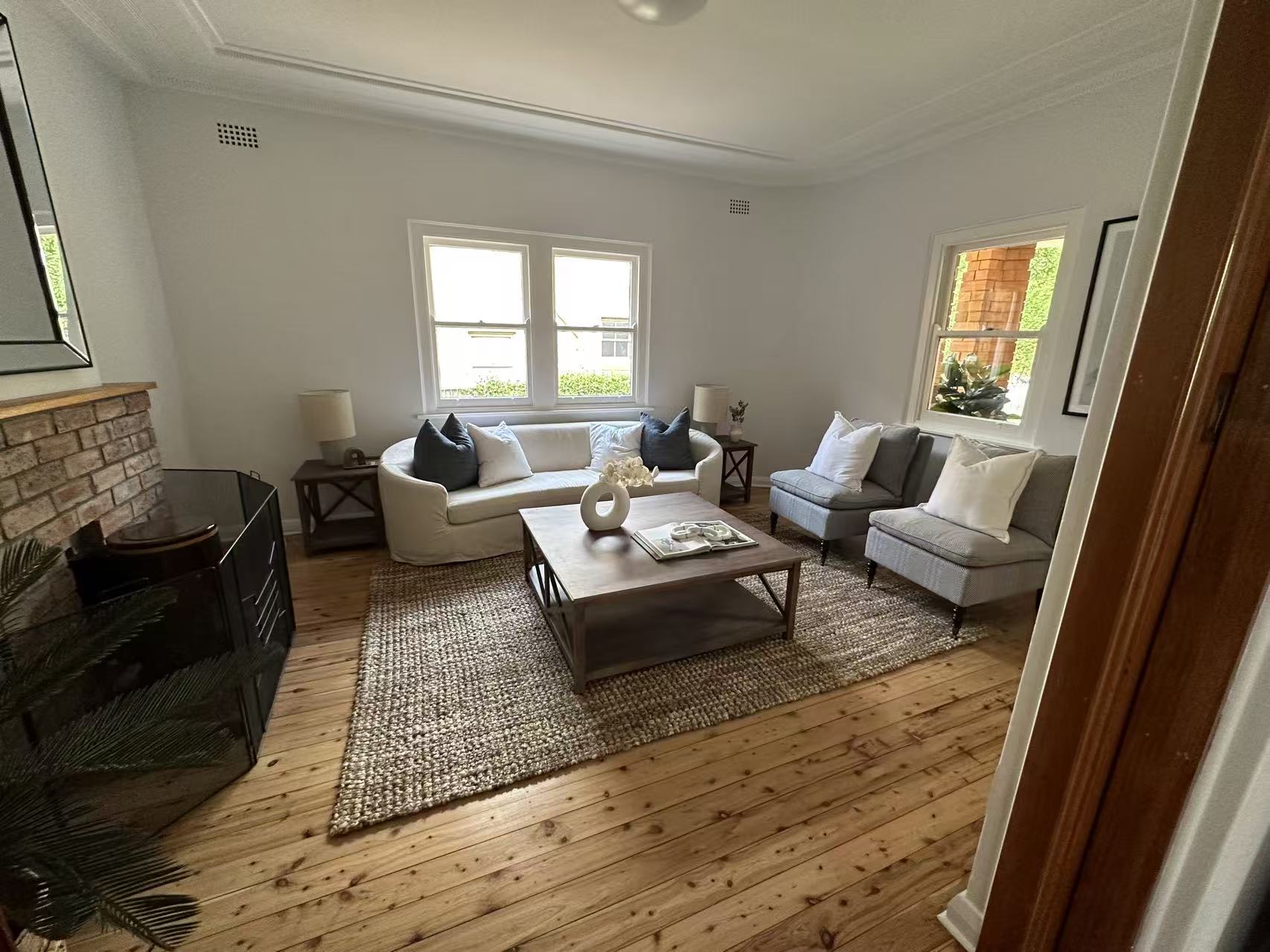Living room with sanded and polished timber floorboards, styled, Eastwood