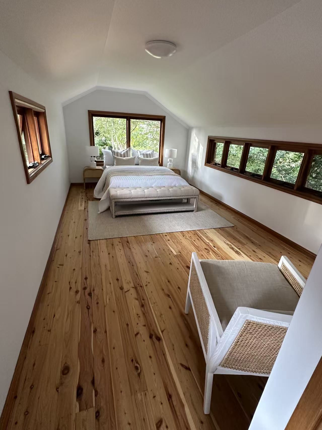 Loft bedroom with sanded and polished timber floorboards, styled, Eastwood
