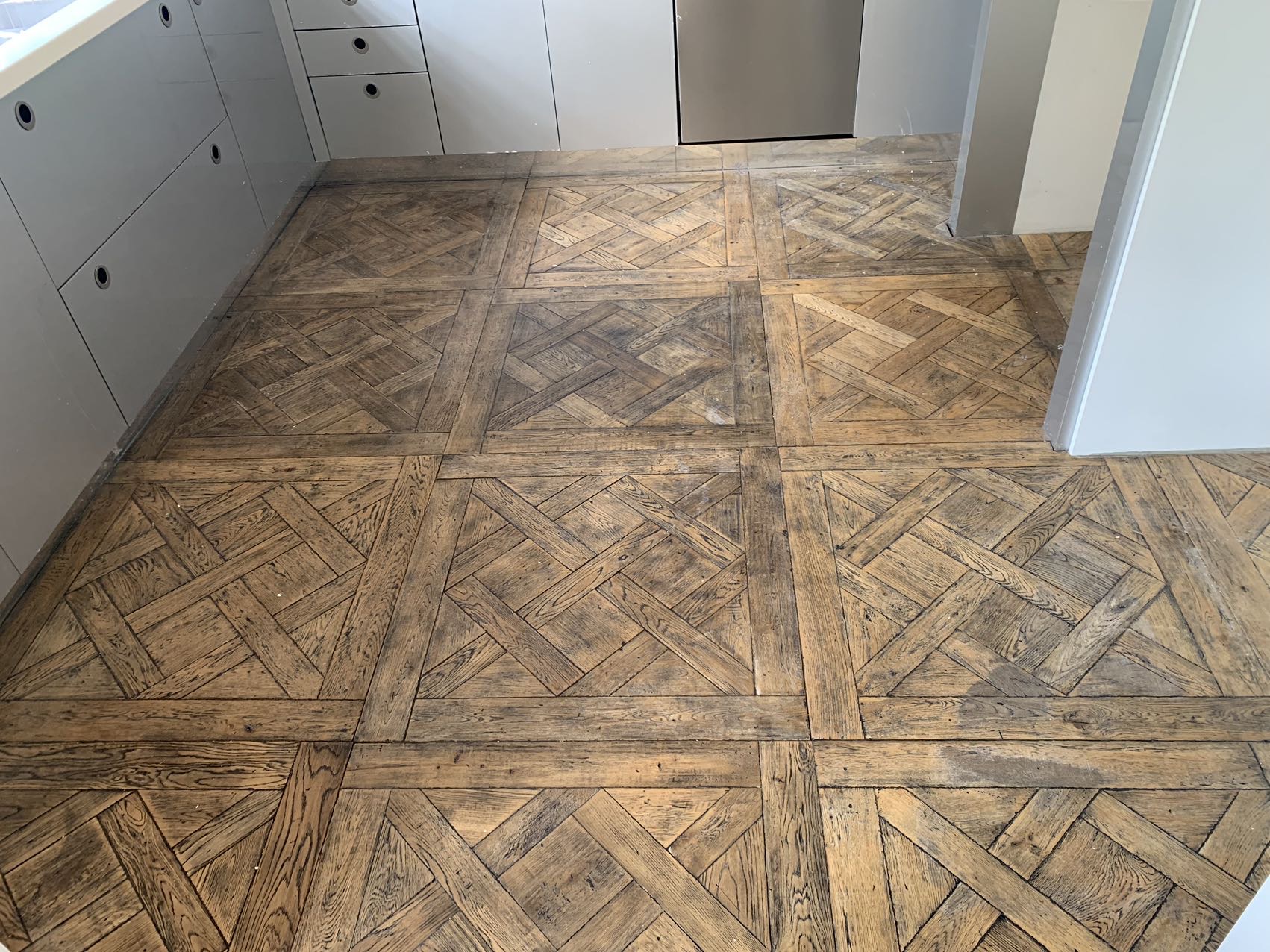 Restored herringbone parquetry timber floor, kitchen