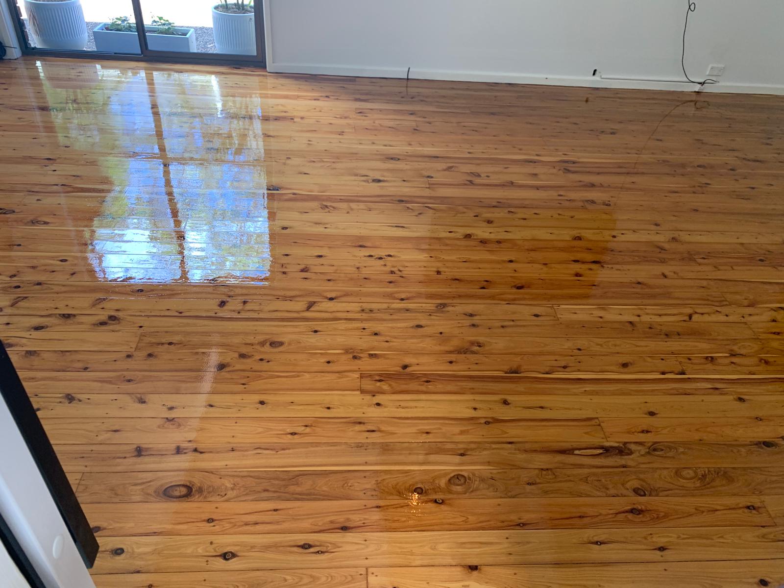 Living room timber floor finished, gloss sheen, Jervis Bay