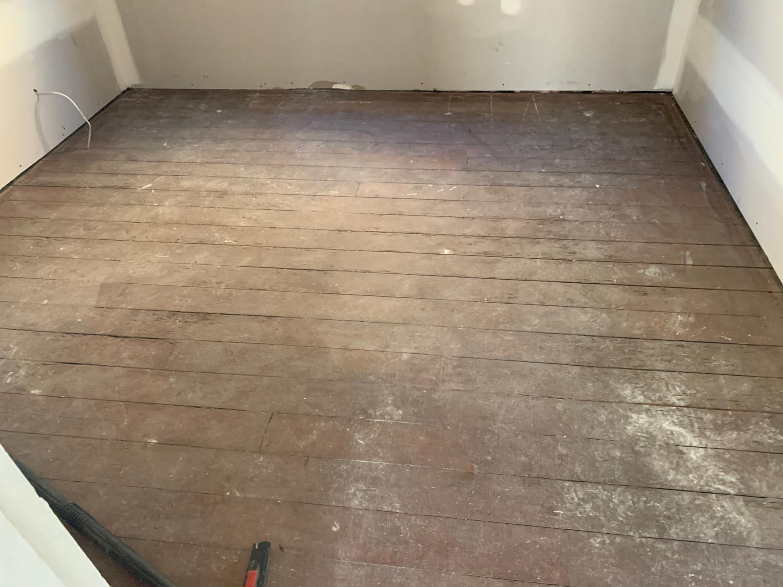 Old grimy timber floor before sanding, kitchen, St Peters